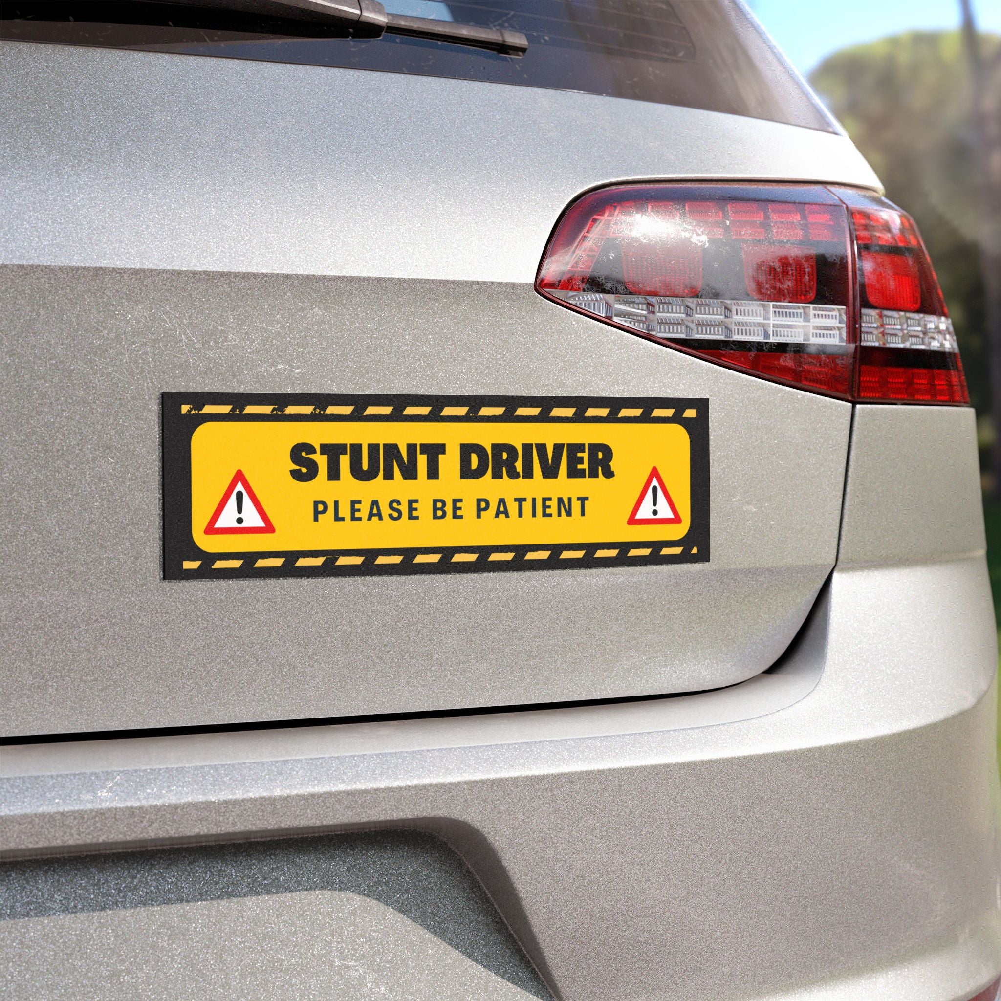 Stunt Driver Car Magnet — Funny Yellow Road Safety Sticker (“Please Be Patient”)