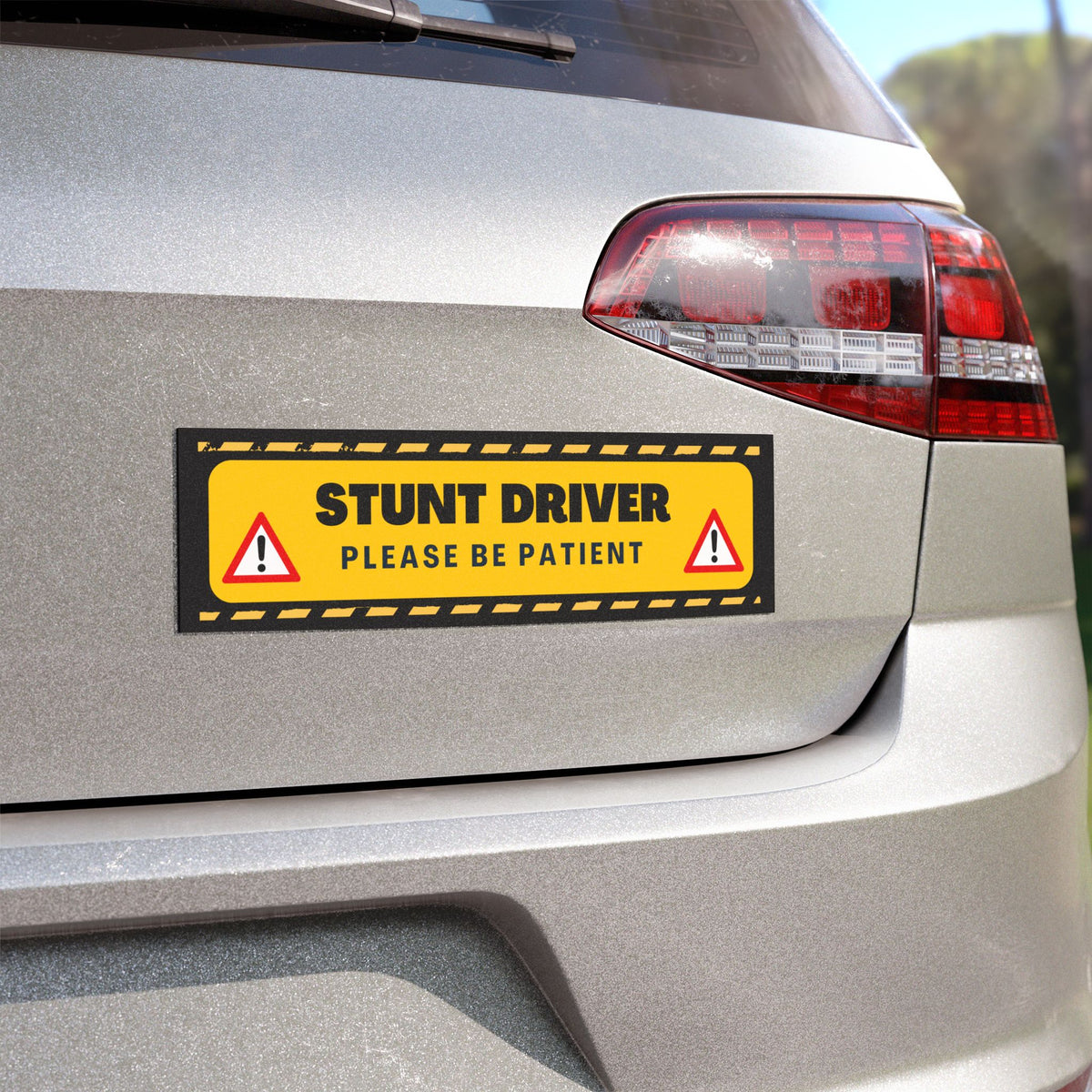 Stunt Driver Car Magnet — Funny Yellow Road Safety Sticker (“Please Be Patient”)