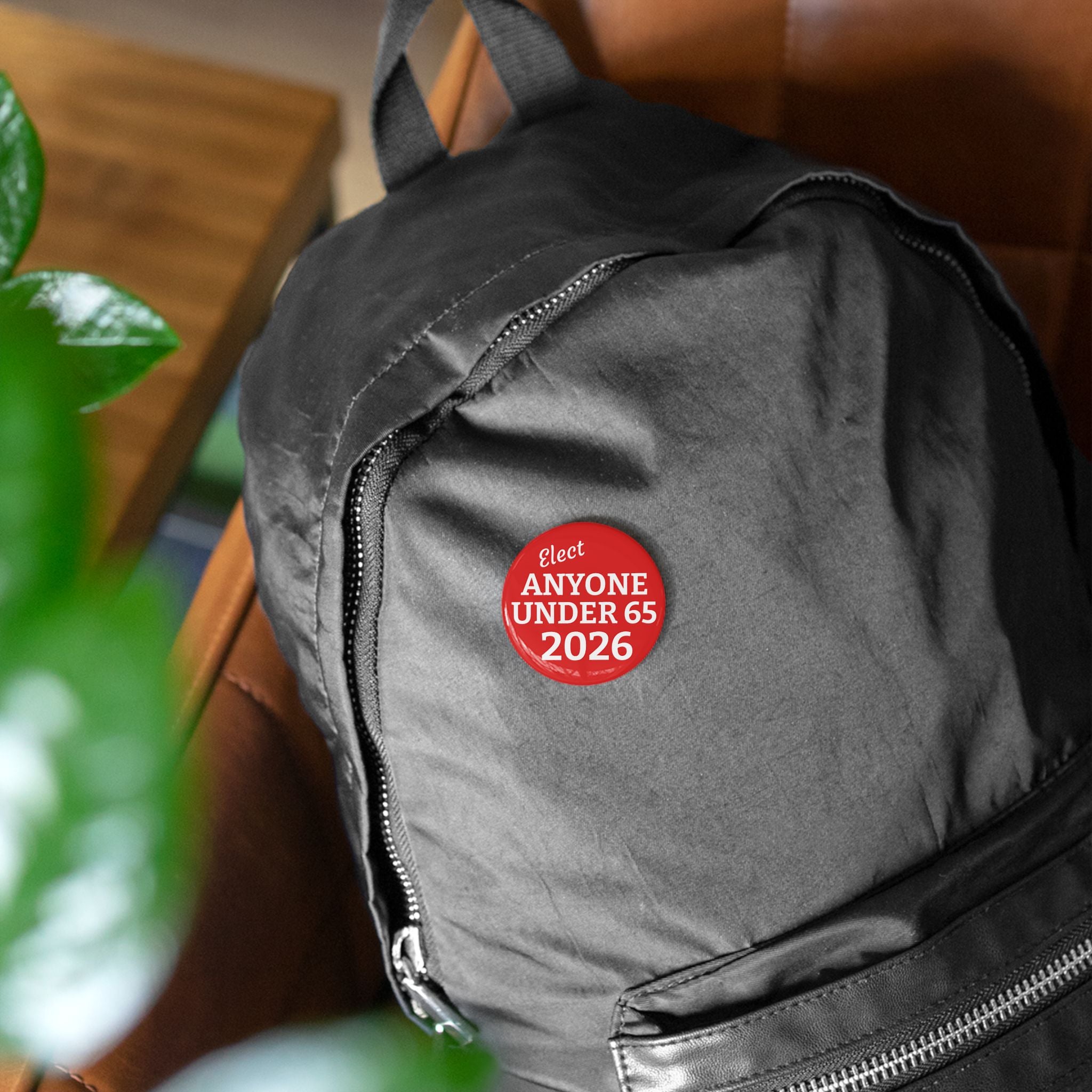 Round Pin Button — "Elect Anyone Under 65 2026" Political Campaign Button
