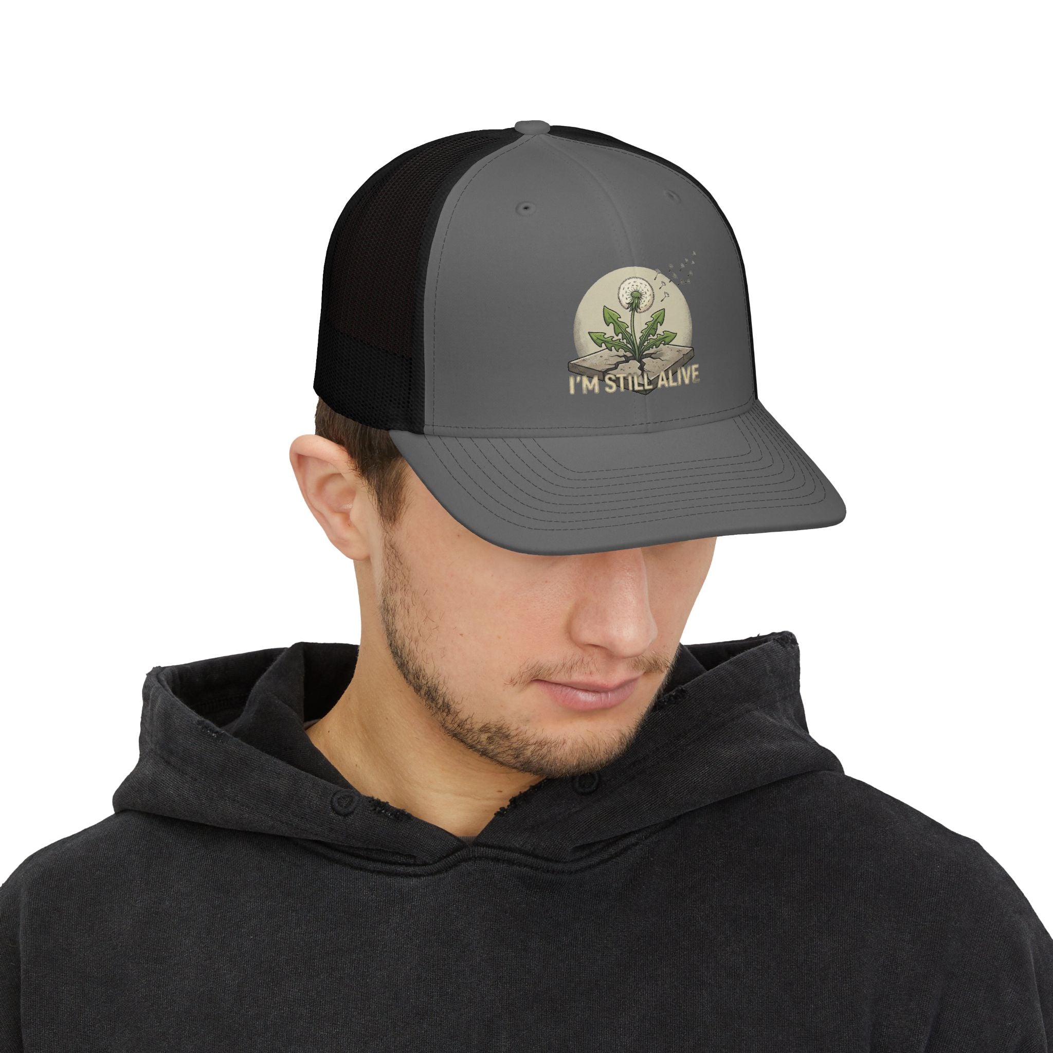 I'm Still Alive Trucker Cap — Dandelion Resilience Snapback
